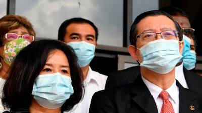 Lim Guan Eng, Phang Li Koon plead not guilty to corruption