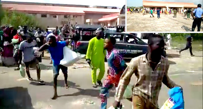 Security Officials Watch Helplessly As Crowd Loots COVID-19 Palliatives In Ilorin