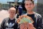 Anger, violence after fake money handed out in ‘$100k cash drop’