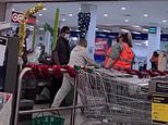 Terrifying moment frenzied Woolworths customer screams at staff and security