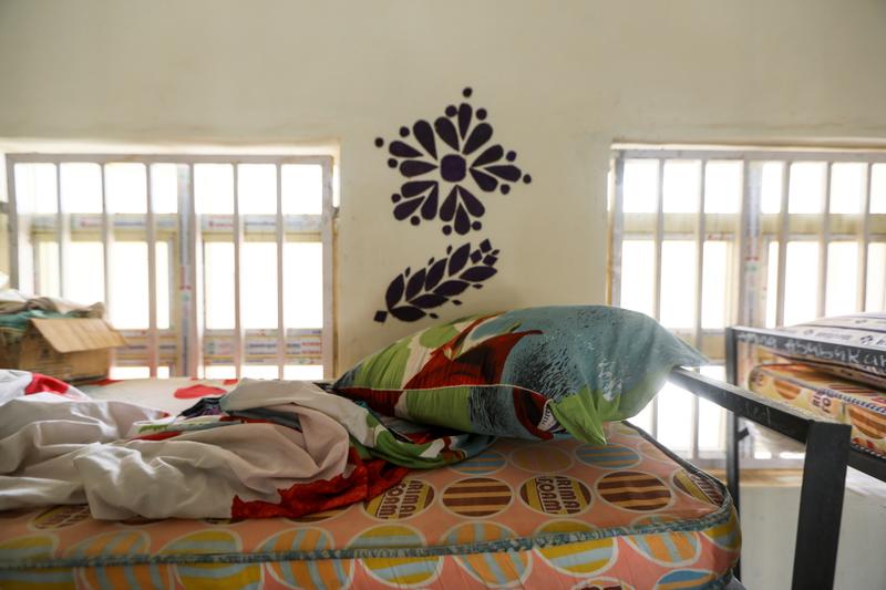 Families wait as Nigerian security forces search for 300 abducted girls