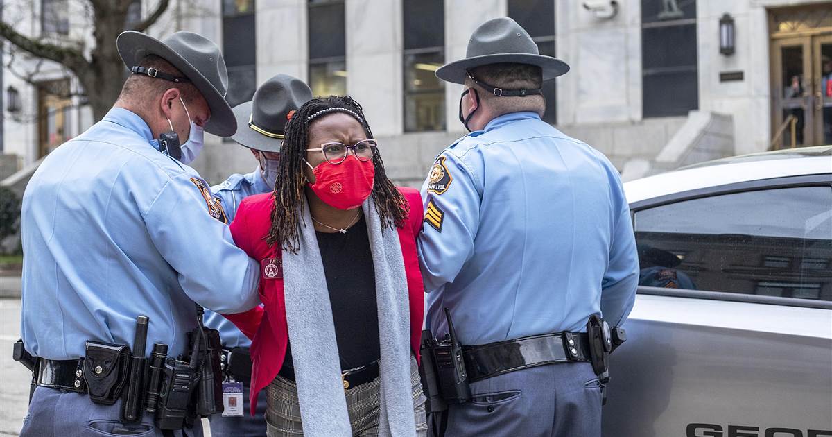 Georgia legislator arrested for protesting voting law says signing of bill ‘far more serious crime’