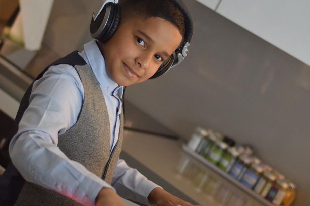 Pint-sized mathematician Adam launches poetry book to raise money