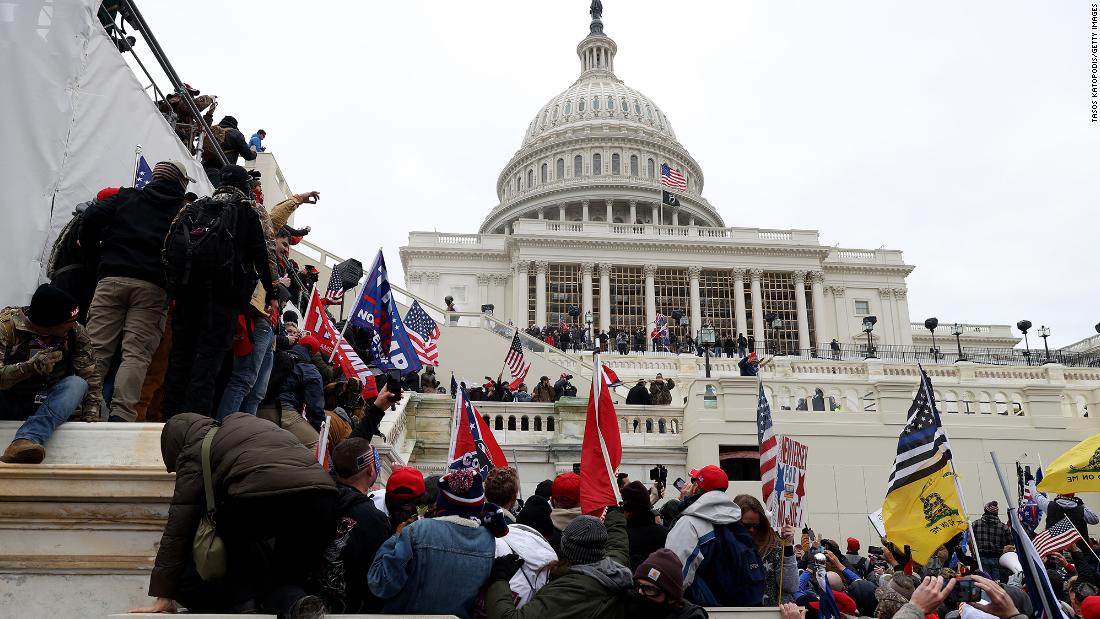 Senate report reveals new details about security failures ahead of January 6 attack but omits Trump’s role