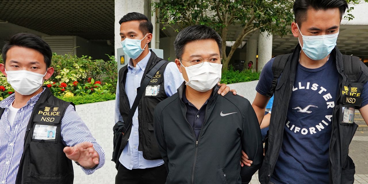 Hong Kong Police Arrest Newspaper Editor Under National Security Law