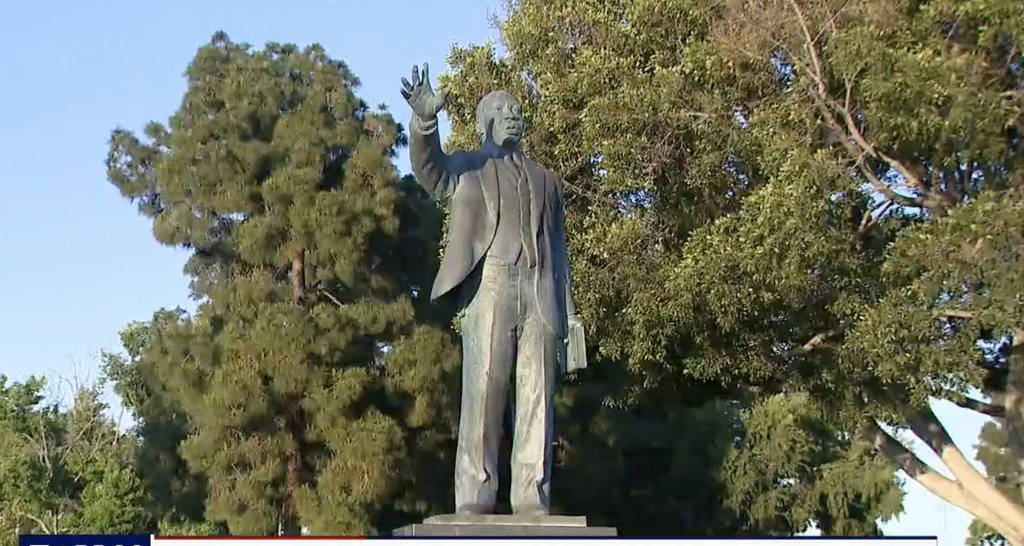 Martin Luther King Jr statue covered in swastikas being investigated as hate crime