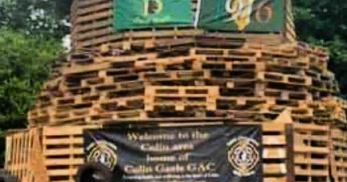 Gaelic club condemns ‘hate crime’ as banner put on bonfire