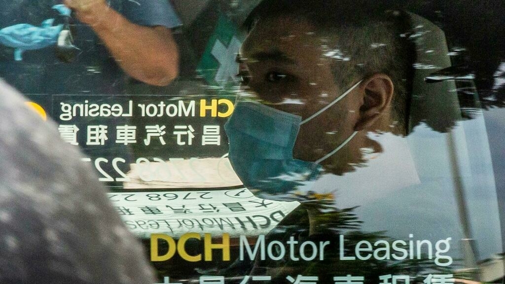 Hong Kong protester sentenced to nine years in first conviction under national security law