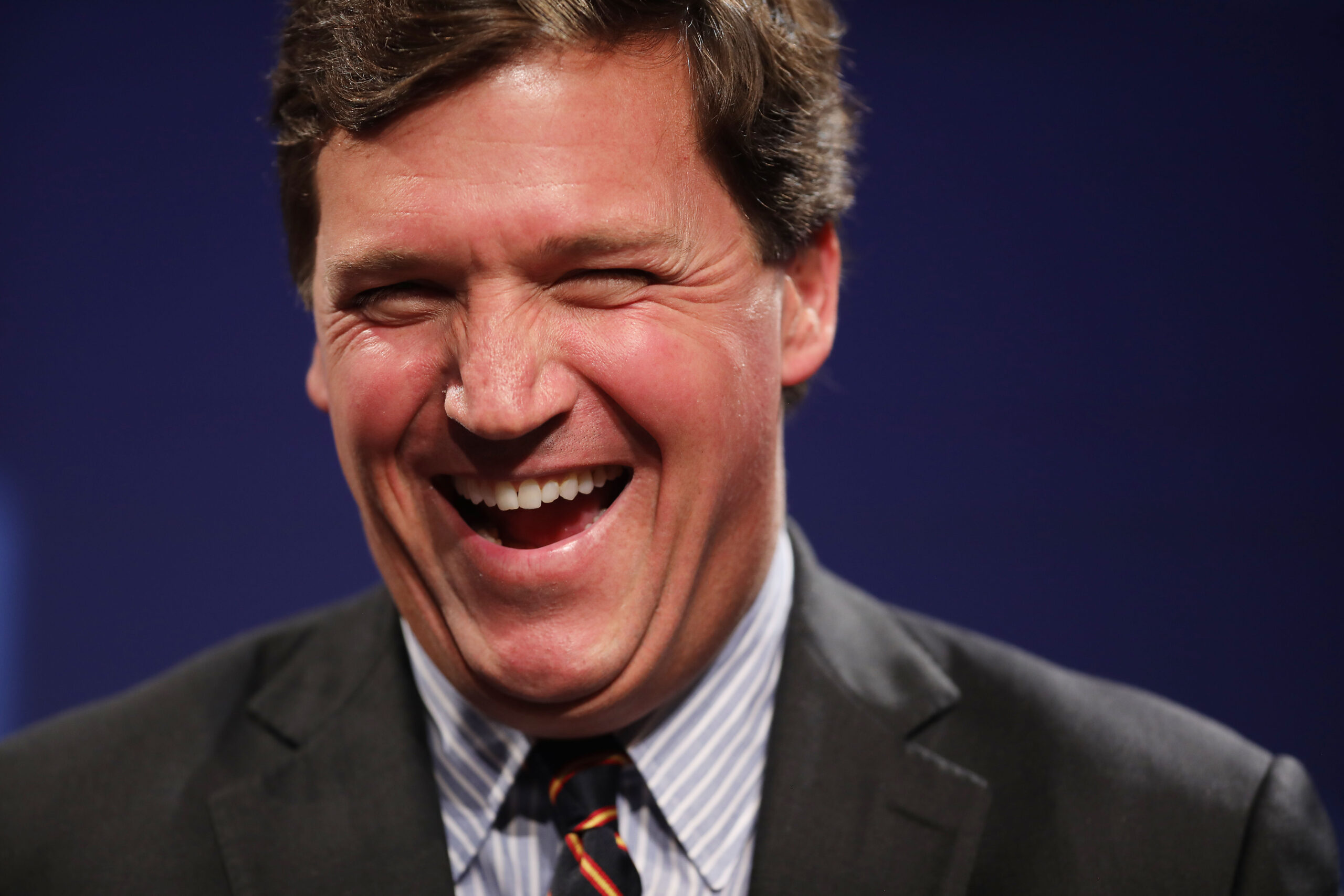 Tucker Carlson’s Hungary trip culminates with rant calling immigrants “chaos and filth and crime”