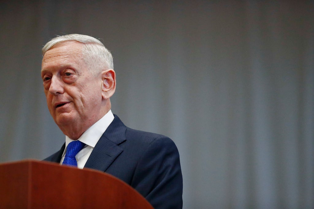 Former US defense secretary testifies in Holmes fraud trial