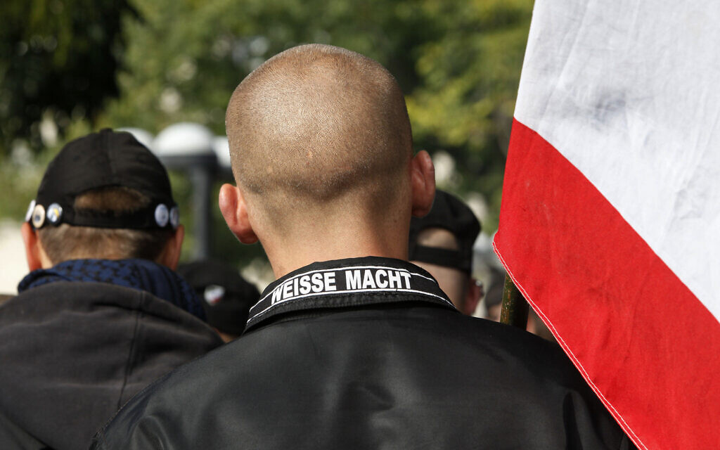 Toeing line of Facebook rules, neo-Nazis able to use platform to make money