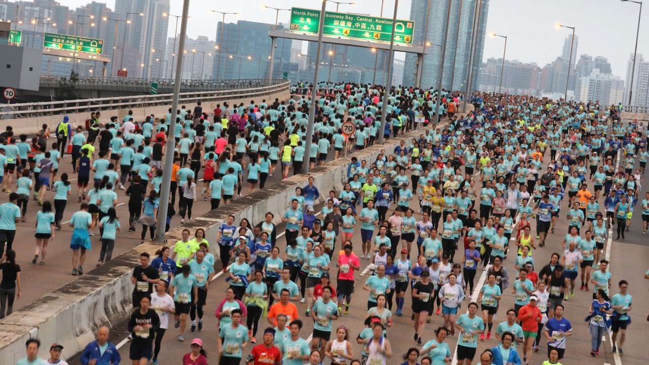 Hong Kong Marathon warns runners against breaking law with political slogans in first mass participation sports event of national security era