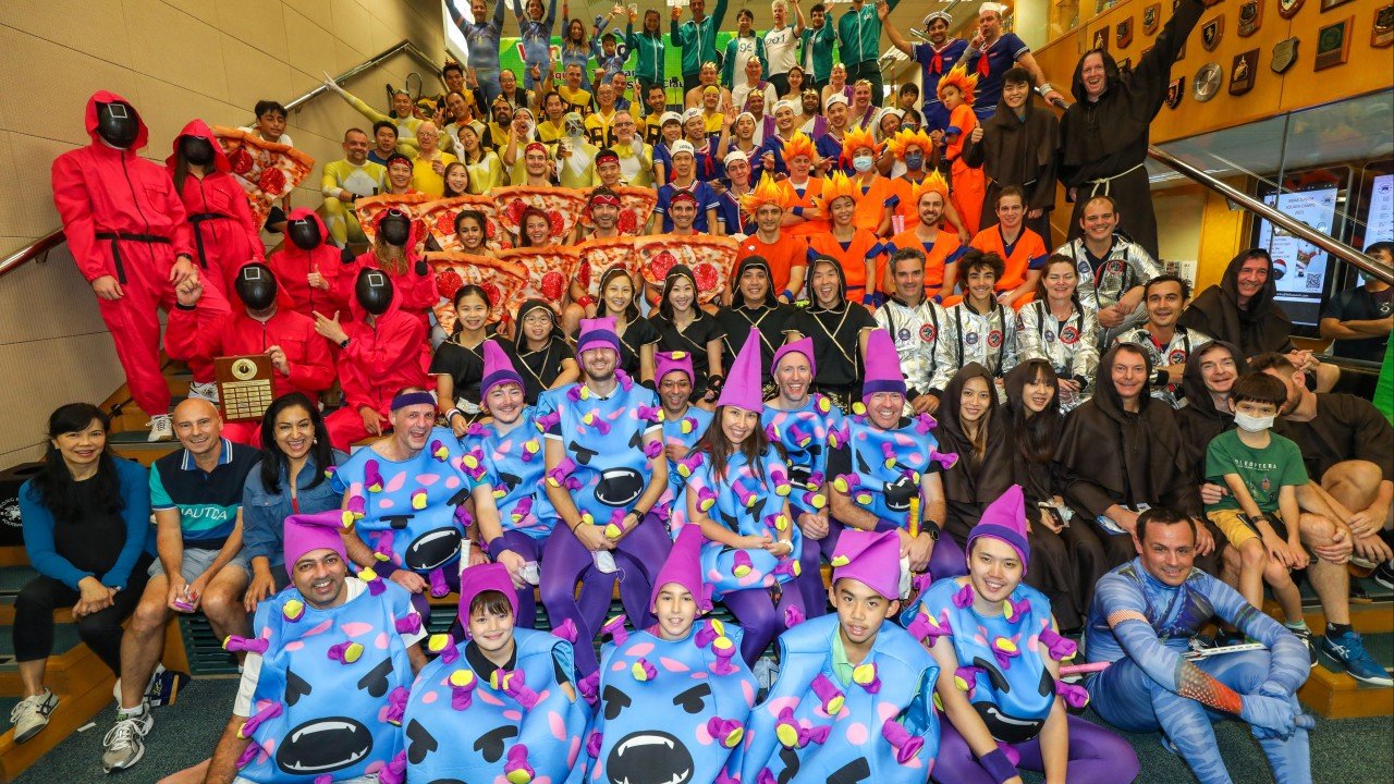 Lighthearted Hong Kong squash tournament raises serious money for Operation Santa Claus