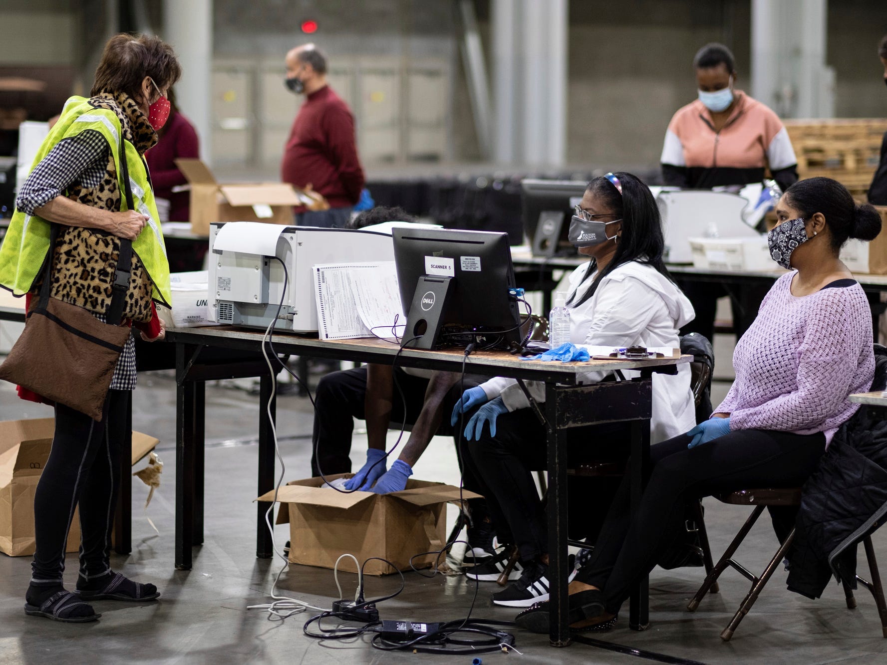 2 election workers in Georgia who were targeted by Trump allies over false fraud claims are suing a right-wing website for defamation