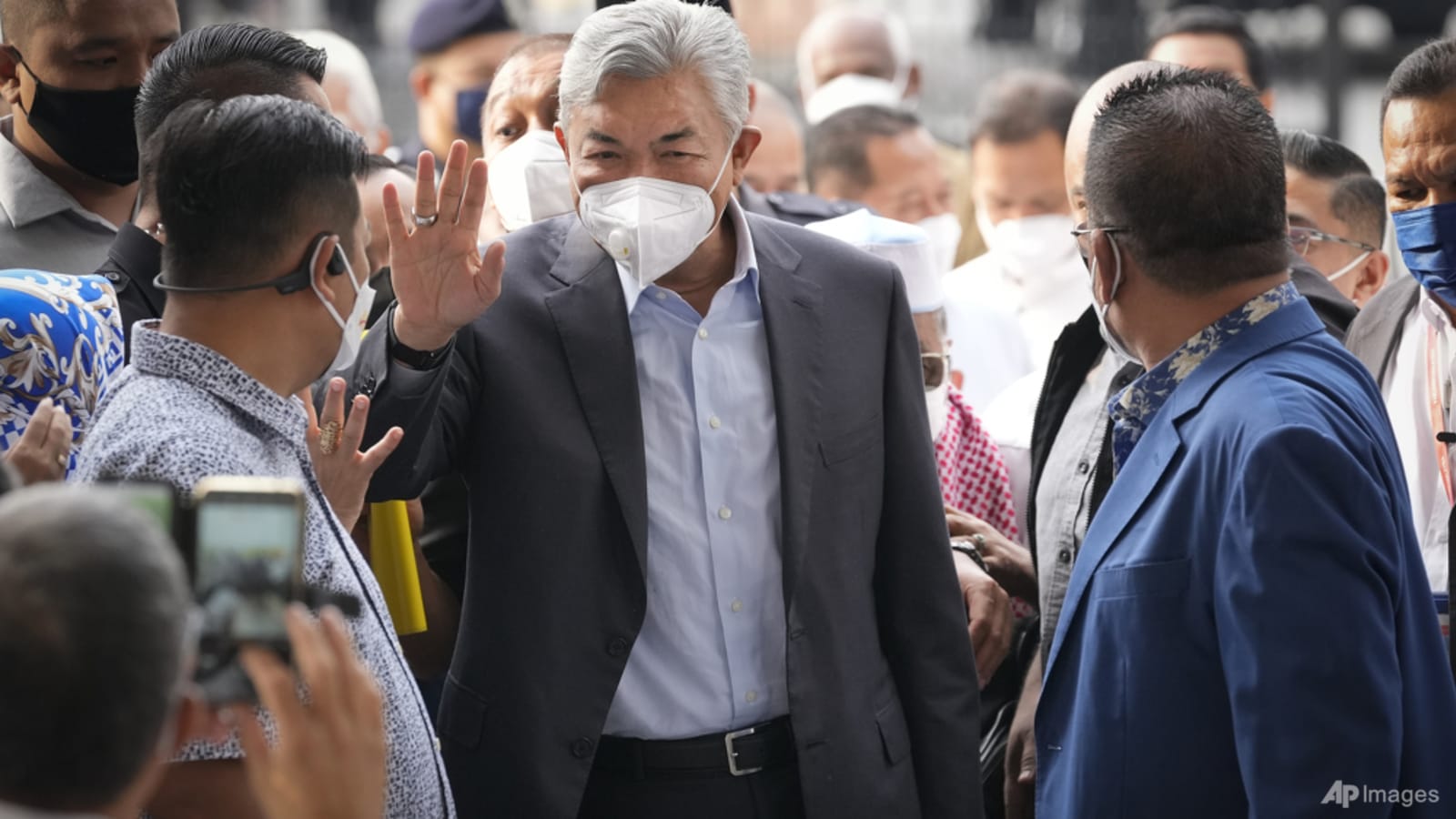 UMNO president Ahmad Zahid ordered to enter defence on corruption, money laundering charges